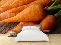 fototapeta na stenu cerstvo umyta mrkva na starom dreve 1